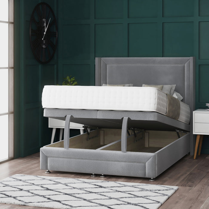 a grey ottoman bed